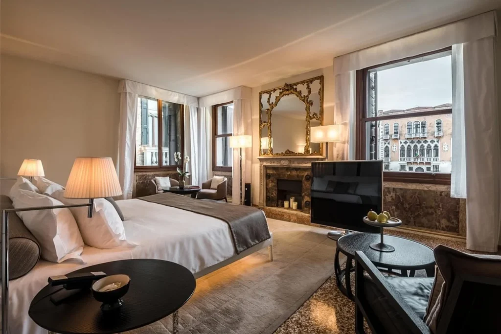 Luxury bedroom with canal view at Aman Venice
