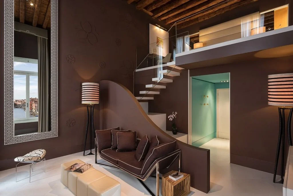 Stylish luxury suite with views toward the Venetian lagoon at Sina Centurion Palace in Venice